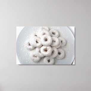 Close-up of powdered doughnuts in a plate canvas print