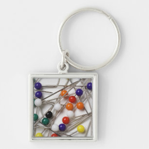 Close-up of straight pins key ring