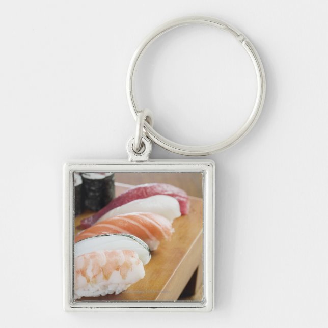 Close-up of sushi on a table key ring (Front)