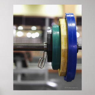 Close-up of the weights on a barbell poster
