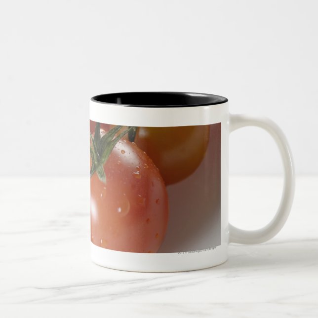 Close-up of tomatoes on a tray Two-Tone coffee mug (Right)