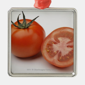 Close-up of two tomatoes metal tree decoration