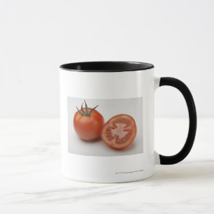 Close-up of two tomatoes mug