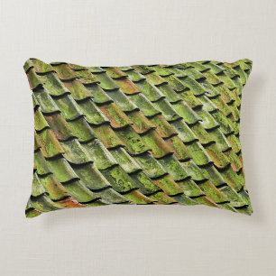 Close-up photo of green shingle roof decorative cushion