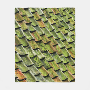 Close-up photo of green shingle roof fleece blanket