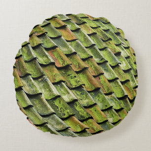 Close-up photo of green shingle roof round cushion