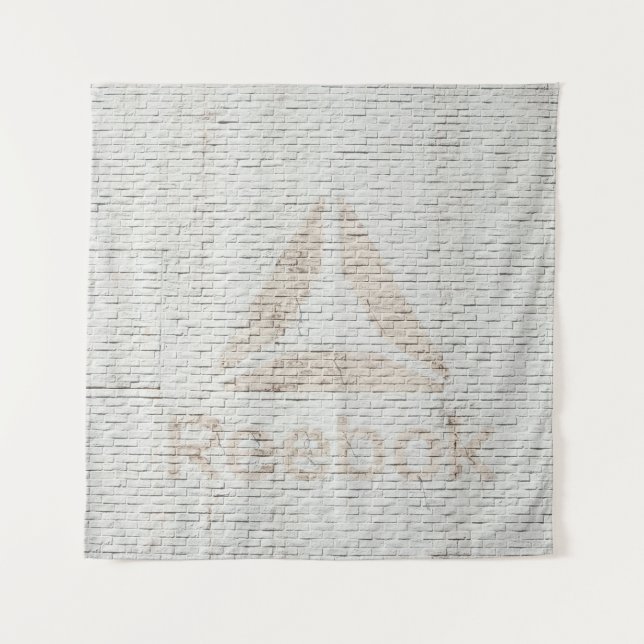 Close-up photo of Reebok logo on wall Tapestry (Front)