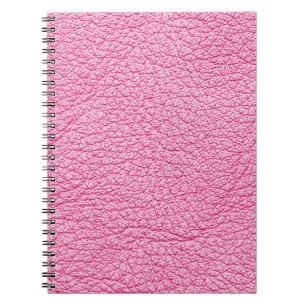 Close-up pink leather, textured background. notebook