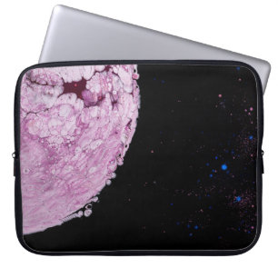 Close view of pink planet cartoon image laptop sleeve