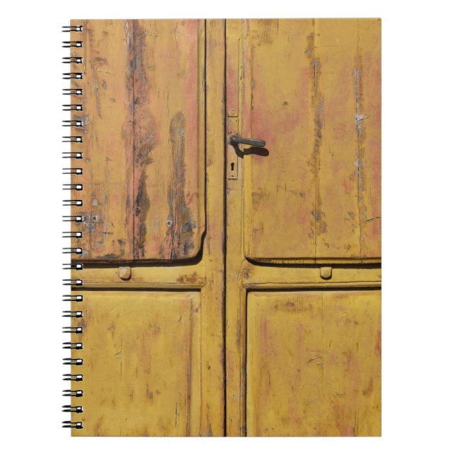 Closed brown wooden cabinet notebook (Front)