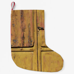 Closed brown wooden cabinet small christmas stocking