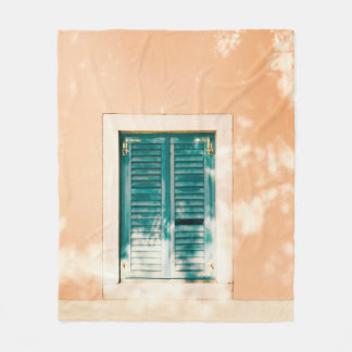 Closed green wooden door fleece blanket