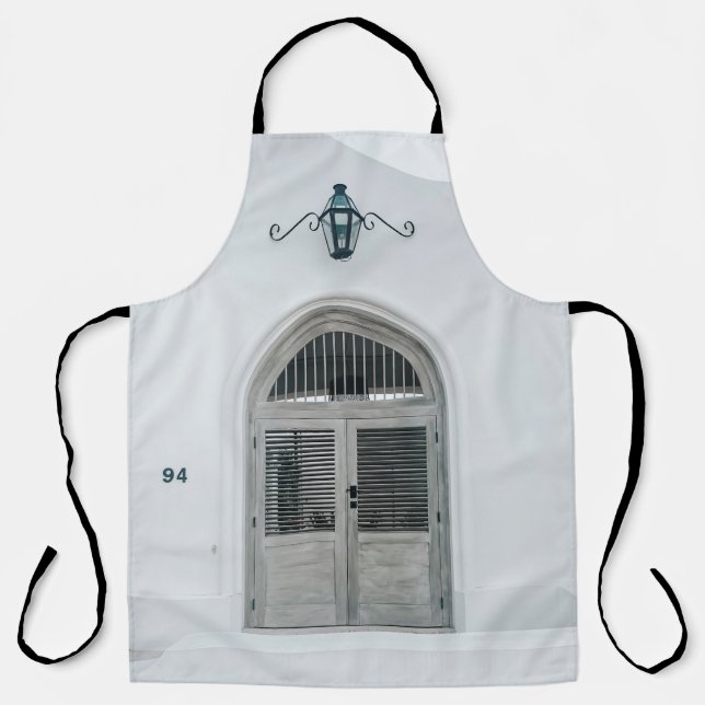 CLOSED GREY WOODEN DOOR BELOW BLACK LIGHT SCONCE APRON (Front)