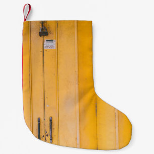CLOSED YELLOW WOODEN DOOR WITH PADLOCK SMALL CHRISTMAS STOCKING