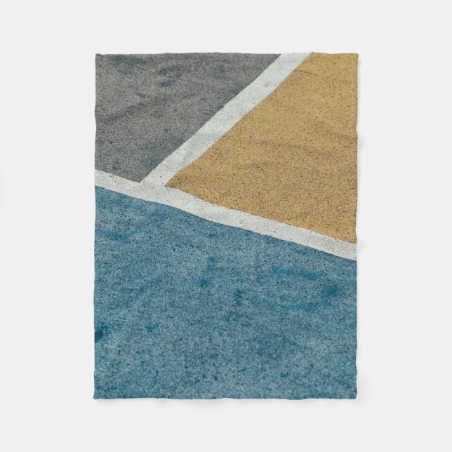 Closeup grey, yellow, and blue painted pavement fleece blanket (Front)