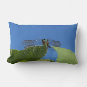 Closeup of a dragonfly against a bright blue sky lumbar cushion