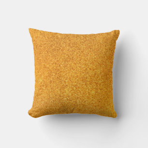 Closeup of golden matte metal texture. Shiny metal Cushion