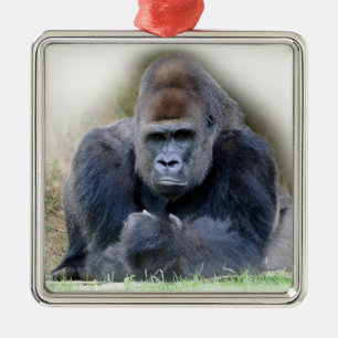 Closeup of gorilla lying on grass metal tree decoration