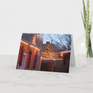 Closeup of holiday lights on building card