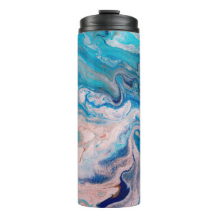 Closeup of mixed blue and white abstract marble te thermal tumbler