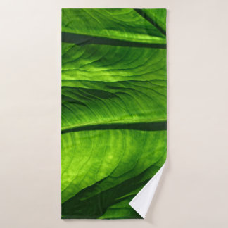 Closeup photo of green leaf bath towel