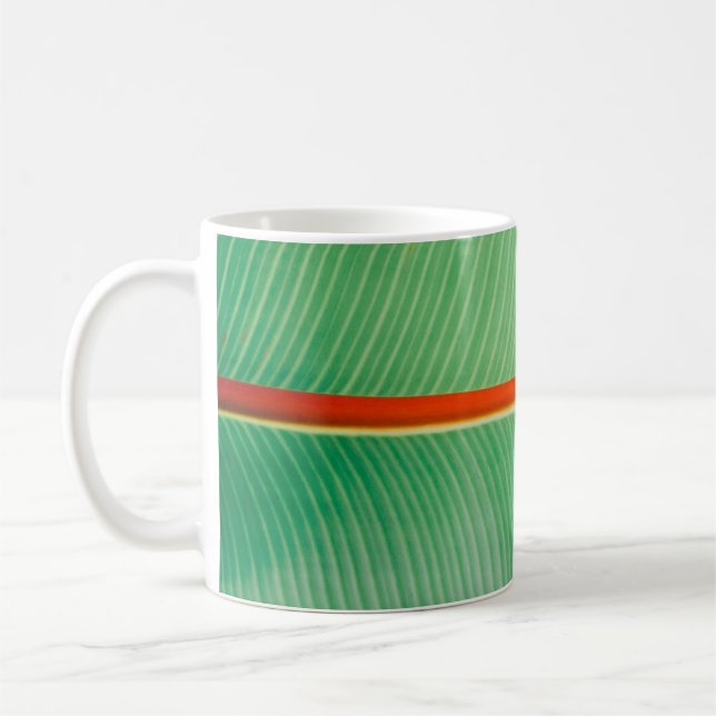 Closeup photo of green leaf coffee mug (Left)