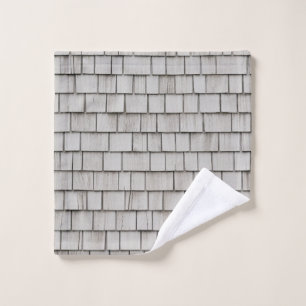 Closeup photo of grey roof shingles wash cloth