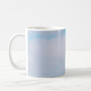 Closeup photo of lounger chairs and beach umbrella coffee mug