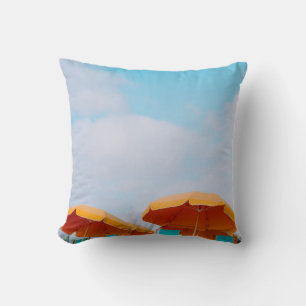 Closeup photo of lounger chairs and beach umbrella cushion