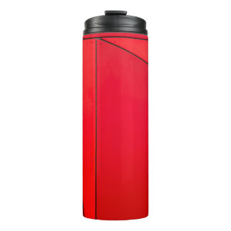 Closeup photo of red board thermal tumbler
