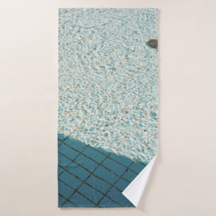 Closeup photo of white tile lot bath towel