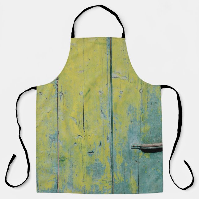 Closeup photo of yellow and teal wooden board apron (Front)