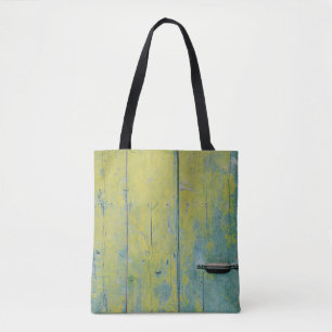 Closeup photo of yellow and teal wooden board tote bag