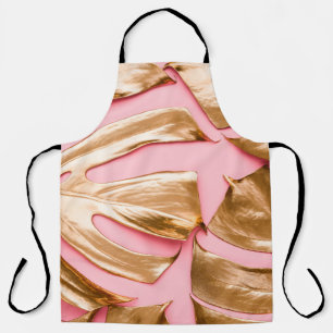 Closeup view of natural gold painted monstera trop apron