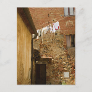 Clothes hanging to dry on a clothesline, postcard