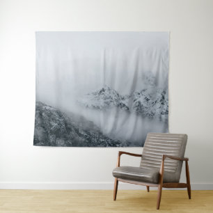 Clouds flowing over mountains tapestry