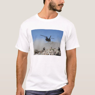 Clouds of dust kicked up by the rotor wash T-Shirt