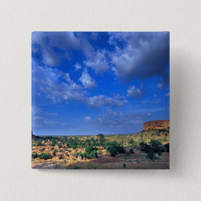Clouds sweeping across the sky over the 15 cm square badge (Front)