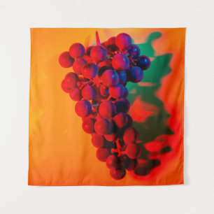 Cluster of blue grape in orange neon light. Food b Tapestry