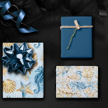 Coastal Chic | Modern Blue and Gold Under the Sea Wrapping Paper Sheet<br><div class="desc">Whimsical dusty blue and gold hand-painted nautical watercolor "under the sea" beach design brings a modern twist to an old theme. The collection features seashells, starfish, a seahorse, and coral reef in complimenting shades of blue, gold, and off white with a splash of blue for a water effect. For other...</div>