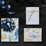 Coastal Chic | Modern Blue and Gold Under the Sea Wrapping Paper Sheet<br><div class="desc">Whimsical dusty blue and gold hand-painted nautical watercolor "under the sea" beach design brings a modern twist to an old theme. The collection features seashells, starfish, a seahorse, and coral reef in complimenting shades of blue, gold, and off white with a splash of blue for a water effect. For other...</div>