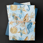 Coastal Chic | Modern Blue and Gold Under the Sea Wrapping Paper Sheet<br><div class="desc">Whimsical dusty blue and gold hand-painted nautical watercolor "under the sea" beach design brings a modern twist to an old theme. The collection features seashells, starfish, a seahorse, and coral reef in complimenting shades of blue, gold, and off white with a splash of blue for a water effect. For other...</div>
