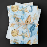 Coastal Chic | Modern Blue and Gold Under the Sea Wrapping Paper Sheet<br><div class="desc">Whimsical dusty blue and gold hand-painted nautical watercolor "under the sea" beach design brings a modern twist to an old theme. The collection features seashells, starfish, a seahorse, and coral reef in complimenting shades of blue, gold, and off white with a splash of blue for a water effect. For other...</div>
