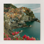 Coastal Cliffside Italian Travel Jigsaw Puzzle<br><div class="desc">Discover the breathtaking beauty of Italy’s coastal cliffs with this vibrant puzzle. Featuring blooming flowers, colourful houses, and sparkling blue waters, the scene captures the charm of seaside life in a Mediterranean village. Each puzzle piece unveils a new detail—from winding paths to scenic views—that transports you to a sunny Italian...</div>