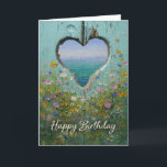 Coastal Heart Wildflower Happy Birthday Greeting  Card<br><div class="desc">This design features a heart-shaped opening in weathered turquoise wood, revealing a peaceful ocean scene with sailboats on the horizon. Framed by colourful wildflowers and rich painterly texture, it creates a serene coastal birthday card with a warm, artistic feel. A beautiful choice for anyone looking for a beach-inspired birthday card,...</div>