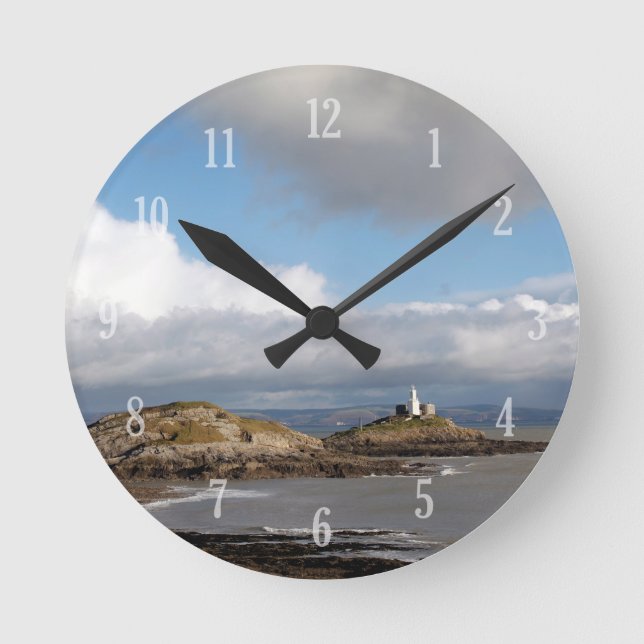 Coastal landscape and lighthouse round clock (Front)