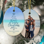 Coastal Merry Beachy Christmas Script Photo Ceramic Tree Decoration<br><div class="desc">This coastal Christmas ornament features a tree-shaped script phrase “Have a very Merry Beachy Christmas” on an abstract beach background, with a photo template on the back. Please visit the collection for more coastal Christmas products, and feel free to contact me on Zazzle Chat if you need a special matching...</div>