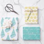 Coastal Seas and Greetings Shell Wrapping Paper Sheet<br><div class="desc">The Seas & Greetings beach themed wrapping paper set includes a sweet seashell Christmas tree,  
starfish pattern and seas & greetings text.</div>