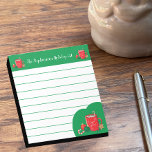 Cocoa Cup Red Green Personalized Christmas Notepad<br><div class="desc">A festive red and green family Christmas ruled notepad with a red cocoa mug . Personalized it with your own text using the template field .This design is also available as a post-it note . 
© ArianeC Illustrations-All rights reserved</div>