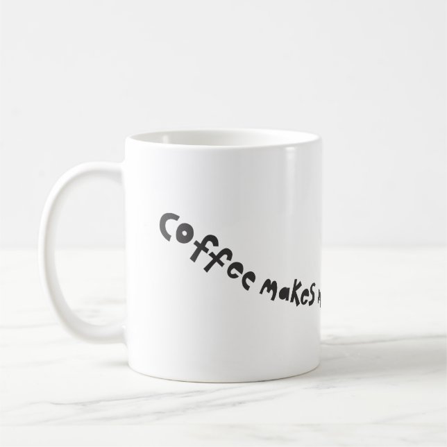 coffee make me buzz mug (Left)